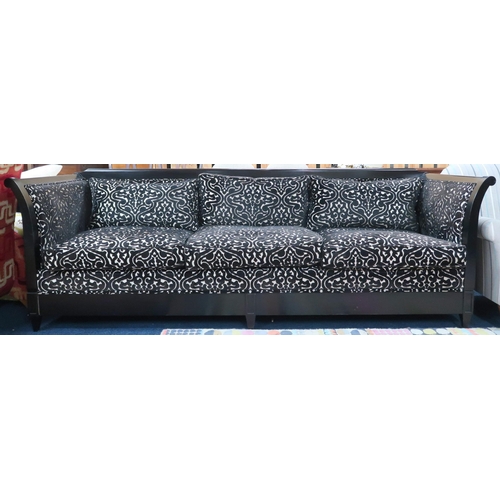 65 - A large contemporary Verona Majestic four seater sofa with embossed damask upholstery on ebonised fr... 