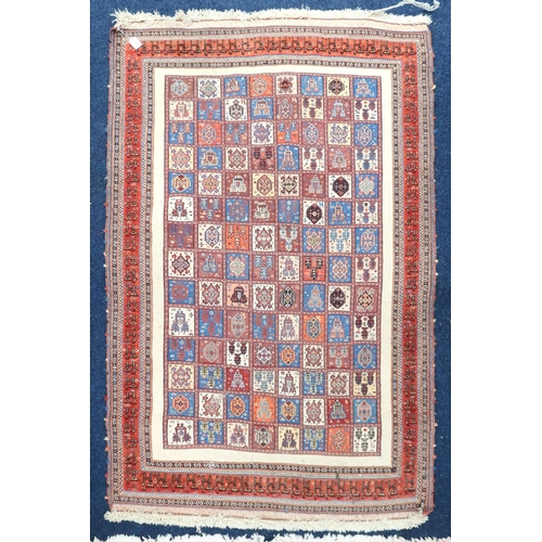 68 - A multicoloured ground Bakhtiari rug with all over panel design within red geometric border, 189cm l... 