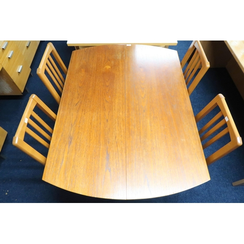 83 - A mid 20th century Greaves & Thomas teak extending dining table, 74cm high x 127cm long x 91cm d... 