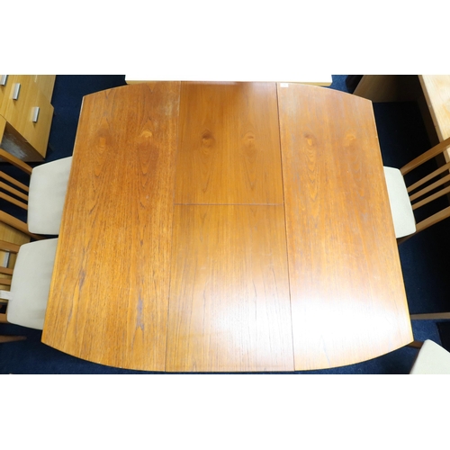 83 - A mid 20th century Greaves & Thomas teak extending dining table, 74cm high x 127cm long x 91cm d... 