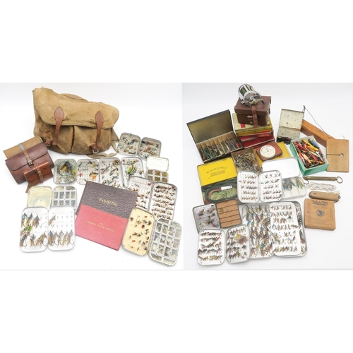 550 - A large quantity of vintage fishing tackle to include a large assortment of cased flies; a part-fill... 