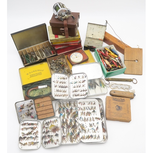 550 - A large quantity of vintage fishing tackle to include a large assortment of cased flies; a part-fill... 