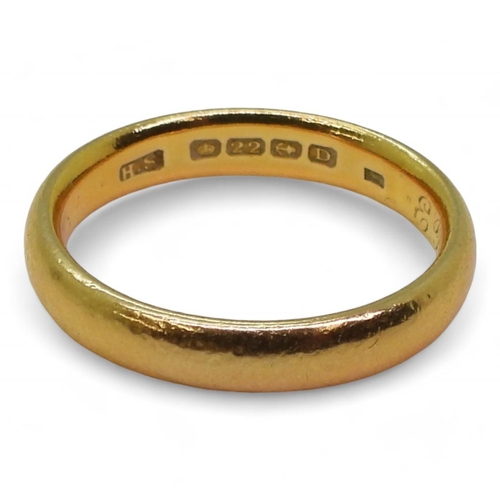 707 - A 22ct gold wedding ring, inscribed within, hallmarked Birmingham 1928 size O, weight 5.3gms