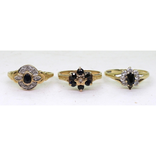 713 - Three 9ct gold rings, sapphire flower ring with diamond accent, size M, sapphire and diamond ring, s... 