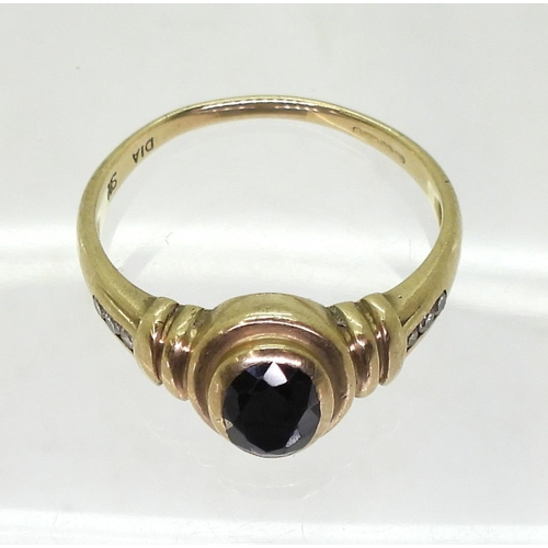 714 - A 9ct gold sapphire and diamond accent ring , size P, weight 3gms