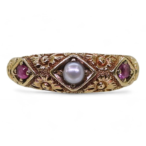 715 - A Victorian pearl and ruby ring engraved with flowers, hallmarked London 1873, size O1/2, weight 2.8... 