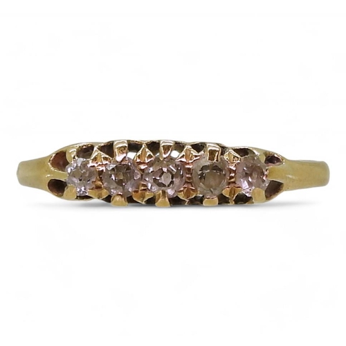 716 - A bright yellow metal vintage ring set with five old cut diamonds, finger size M1/2, weight 1.9gms