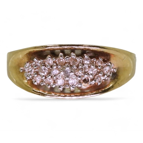 726 - A yellow metal ring stamped 10k set with a diamond cluster, size O, weight 5gms