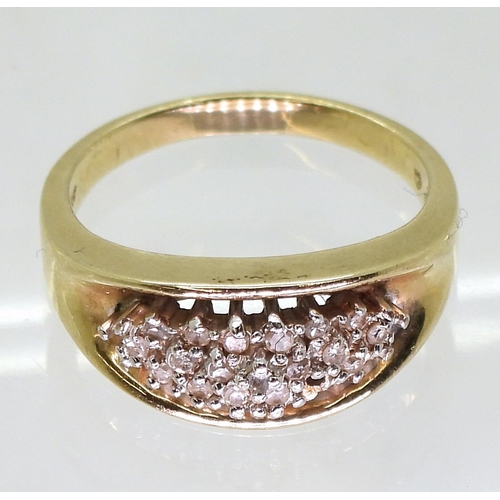 726 - A yellow metal ring stamped 10k set with a diamond cluster, size O, weight 5gms