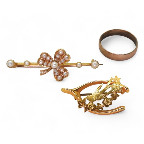 731 - Two lucky brooches, a bright yellow metal shamrock brooch set with pearls, weight 4.4gms, together w... 