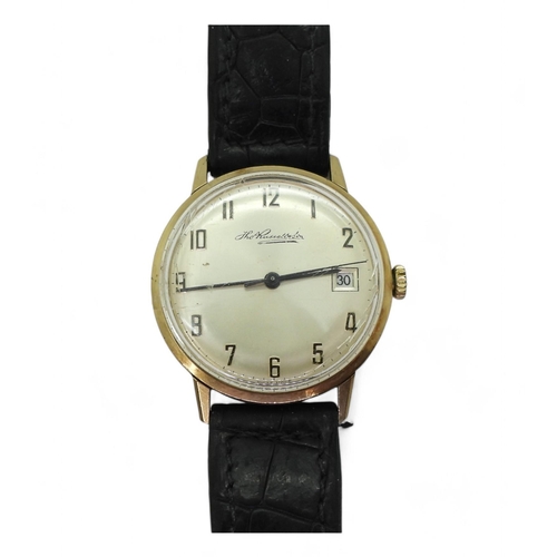 733 - A 9ct gold gents Swiss watch, the dial signed Thomas Russell & Son, inscribed and dated 1976, we... 