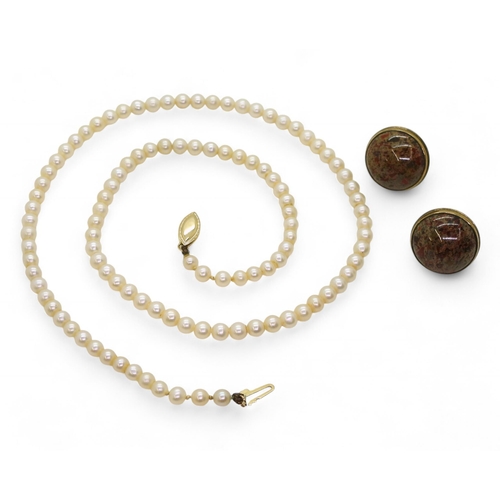 746 - A string of pearls with a 14k gold clasp, length 46cm, together with a pair of 9ct gold statement st... 