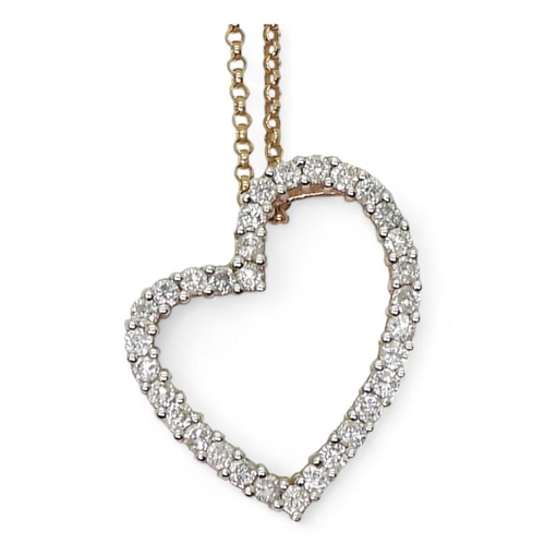 770 - A 14k gold diamond set heart pendant, set with estimated approx 0.50cts of brilliant cut diamonds, o... 