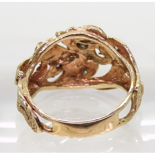 771 - A 9ct gold leaf design ring set with diamond accents, size P, weight 4.5gms