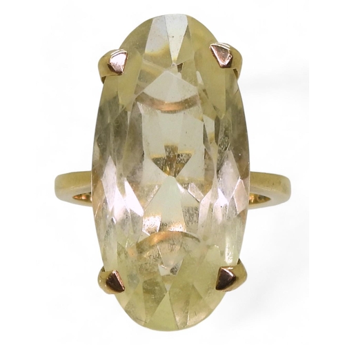 786 - A 9ct gold retro ring set with a long oval cut citrine, size K, weight 6.4gms