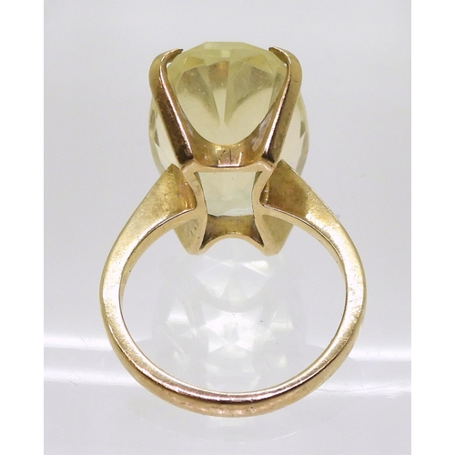 786 - A 9ct gold retro ring set with a long oval cut citrine, size K, weight 6.4gms