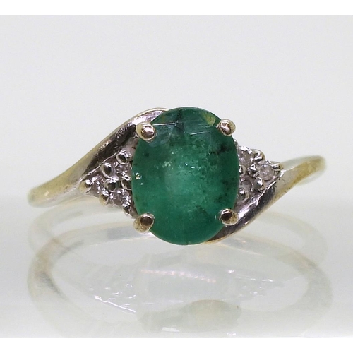 789 - A 9ct white gold emerald and diamond ring, size N1/2, weight 3gms