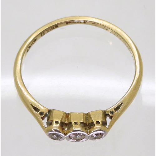 791 - An 18ct gold three stone diamond ring, size N1/2, weight 2gms