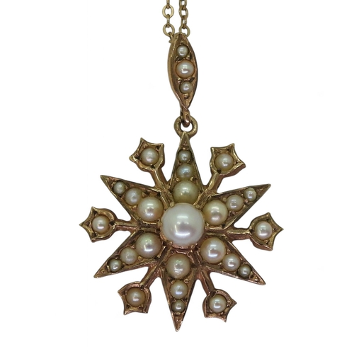 804 - A 9ct gold pearl set star pendant, approx diameter 2.5cm, on a 9ct gold trace chain, 46cm, weight 5.... 