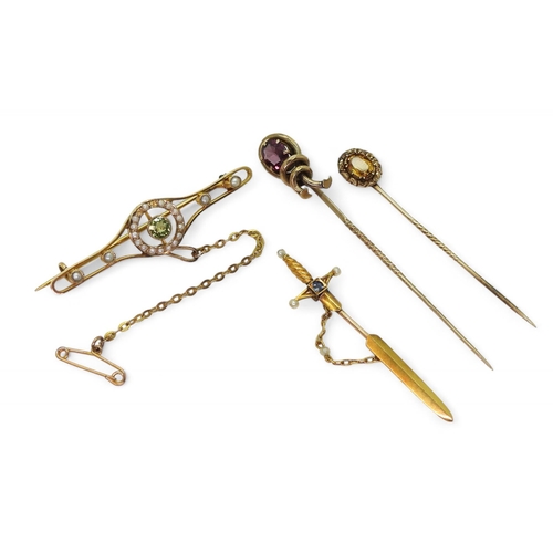 808 - A 9ct gold peridot and split pearl brooch, weight 3.3gms, together with a yellow metal sword pin mou... 