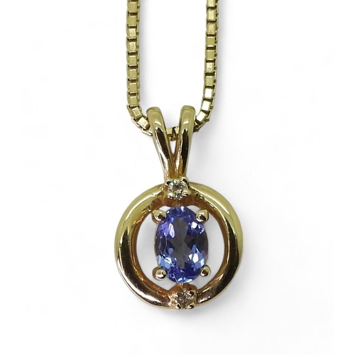 816 - A 14kt gold Tanzanite and clear gem pendant, with a 14kt Italian made box chain, marked Amoro, weigh... 