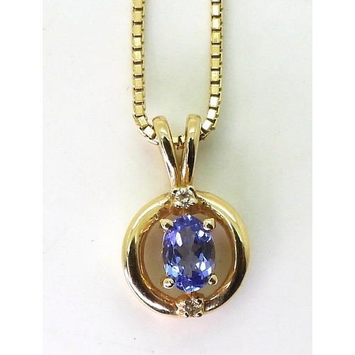 816 - A 14kt gold Tanzanite and clear gem pendant, with a 14kt Italian made box chain, marked Amoro, weigh... 