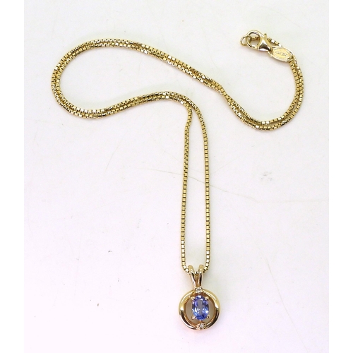 816 - A 14kt gold Tanzanite and clear gem pendant, with a 14kt Italian made box chain, marked Amoro, weigh... 