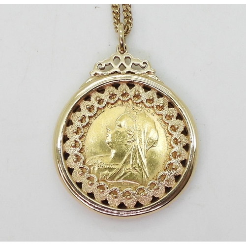 829 - An 1897 half-sovereign mounted in yellow metal, with a 9ct gold chain, weight 15.5gms ... 