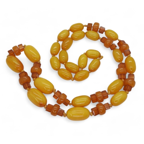 830B - A string of yellow amber, weight 87.6gms