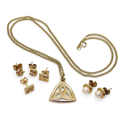 831F - A 9ct gold Celtic knot pendant and chain, with a pair of 9ct gold pearl stud earrings, a pair of 9ct... 