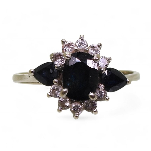 832A - An 18ct white gold sapphire and diamond cluster ring, size N1/2, weight 3.3gms 