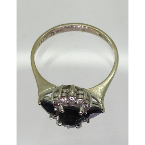 832A - An 18ct white gold sapphire and diamond cluster ring, size N1/2, weight 3.3gms 