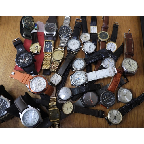 835 - Three boxes of fashion watches, to include a motorized self winder for automatic watches, a two tier... 