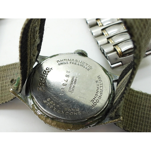 856 - A base metal military pocket watch bears pheon mark and the number P46639, a further collection of f... 