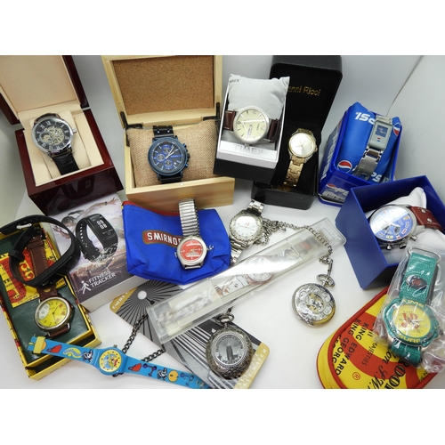 861 - A collection of fashion watches to include, promotional watches for Pepsi, J&B, Smirnoff, a fitn... 