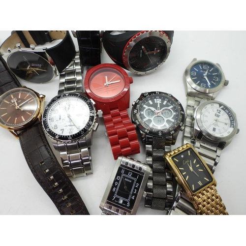 870 - A collection of gents fashion watches to include, Adidas, Skagen, Reebok, Accurist etc