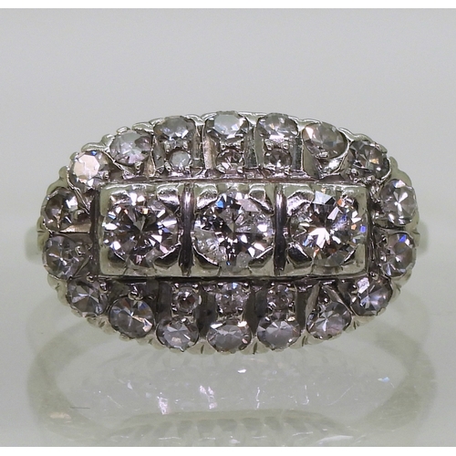 2706 - A DIAMOND DRESS RINGthe 18ct white gold ring with galleried mount is set with estimate approx 1ct of... 