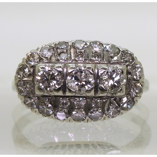 2706 - A DIAMOND DRESS RINGthe 18ct white gold ring with galleried mount is set with estimate approx 1ct of... 