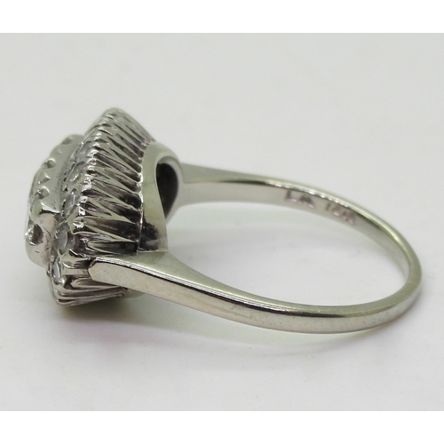 2706 - A DIAMOND DRESS RINGthe 18ct white gold ring with galleried mount is set with estimate approx 1ct of... 