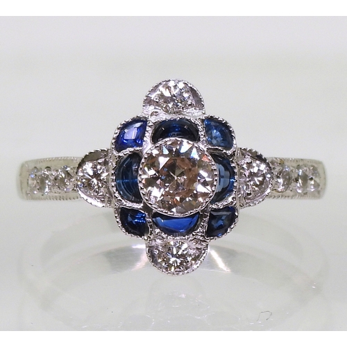 2707 - AN ART DECO STYLE RINGset with brilliant cut diamonds with an estimated approx diamond total of 0.55... 