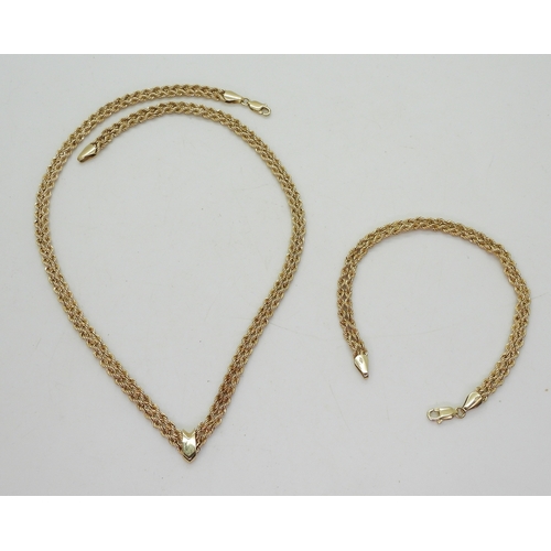 2708 - A NECKLACE & BRACELET SET made from rope chain, with a decorative 'V' shape necklace with matchi... 