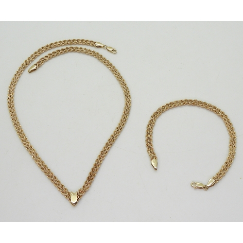 2708 - A NECKLACE & BRACELET SET made from rope chain, with a decorative 'V' shape necklace with matchi... 