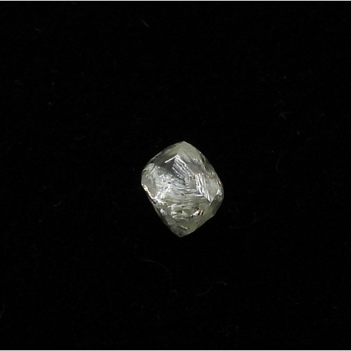 2729 - AN UNCUT DIAMOND CRYSTALweighing in at 0.21gms, and 1.00cts on the scale. dimensions approx 5.85mm x... 