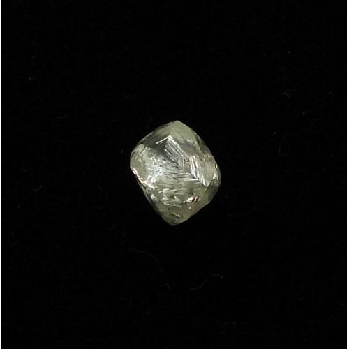 2729 - AN UNCUT DIAMOND CRYSTALweighing in at 0.21gms, and 1.00cts on the scale. dimensions approx 5.85mm x... 