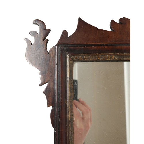 2014 - A 19TH CENTURY MAHOGANY FRETCUT WALL MIRROR with carved gilt eagle decoration, 77cm high x 46cm... 