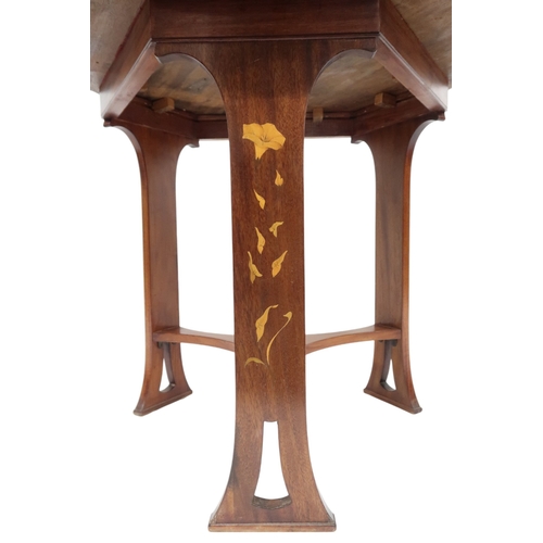 2017 - A LATE 19TH CENTURY MAHOGANY ARTS & CRAFTS CIRCULAR TOPPED WINDOW TABLE with three shaped p... 