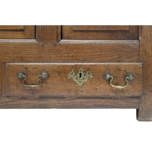 2021 - A 18TH/19TH CENTURY OAK PANELLED BLANKET CHESThinged top over panelled front over two short drawers ... 