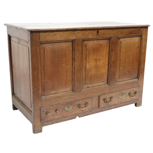 2021 - A 18TH/19TH CENTURY OAK PANELLED BLANKET CHESThinged top over panelled front over two short drawers ... 