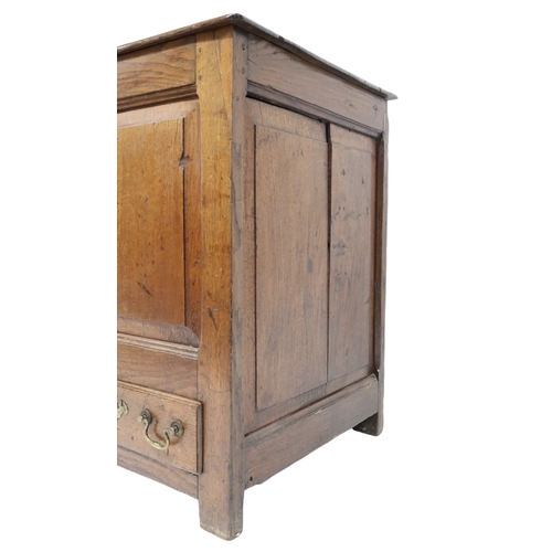 2021 - A 18TH/19TH CENTURY OAK PANELLED BLANKET CHESThinged top over panelled front over two short drawers ... 