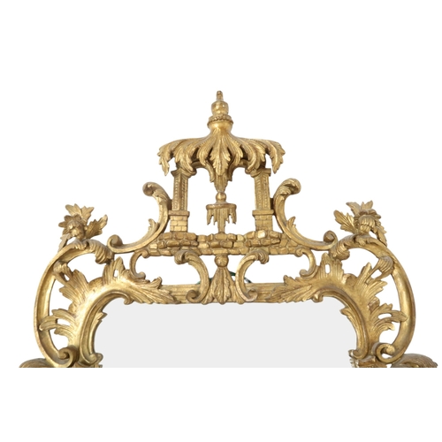 2023 - A GEORGIAN STYLE GILTWOOD CHINESE CHIPPENDALE WALL MIRROR with stylized carved pagoda surmount ... 